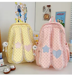 Sweet polka dot rabbit ear backpack with lace trim, cute dual-color casual school bag for girls.