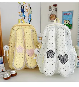 Sweet lace polka dot bunny ear backpack detail with star heart patches and cute plush toys.