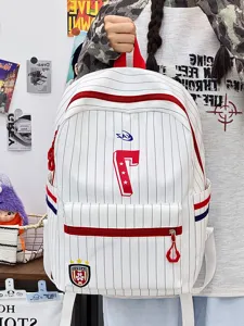 Detailed view of white striped backpack with red zipper and number 7 embroidery design.