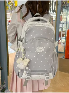 Leuke rugzak met sterrenpatroon en strikhanger, schattige schooltas voor dagelijks gebruik.