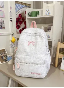 Leuke Japanse stijl strik studenten rugzak detail, grijze schooltas met grote capaciteit.