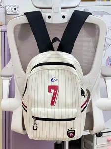 Casual striped canvas backpack for daily commuting, lightweight and stylish bookbag for students.