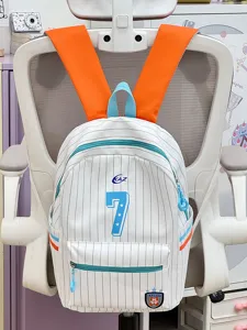 Cute Japanese style striped backpack for school students with orange straps and front logo.