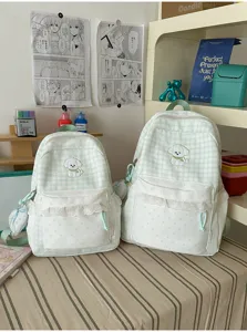 Zoete stijl groene geruite rugzak met schattig hondenborduursel en een kanten voorzak.