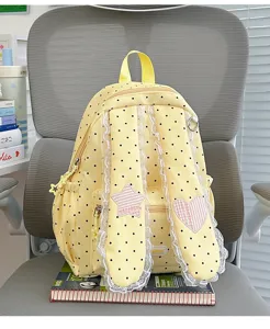 Sweet cute polka dot backpack with lace trim, bunny ears, star and heart patches for girls.