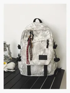 Sac à dos en toile camouflage gris, grande capacité, cartable élégant et résistant pour étudiants.