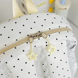 Sweet white polka dot backpack with cute star zipper pulls and lace trim for daily use.