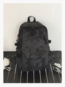 Grand sac à dos tactique sombre, cartable minimaliste résistant à l'usure pour étudiants.