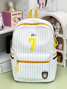 Close-up of Japanese sweet striped backpack, lightweight student bookbag with bright yellow design.
