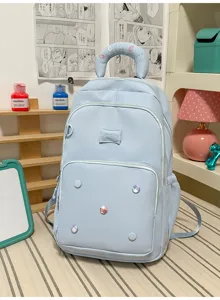 Leuke lichtblauwe studentenrugzak met grote capaciteit en schattig design voor school.