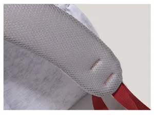 Detail shot of lightweight backpack breathable mesh shoulder strap with durable stitching design.