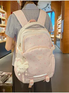 Koreaanse stijl roze sterrenpatroon schoolrugzak, schattige student pendelaar detailweergave.