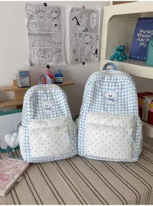 Koreaanse zoete blauw-witte ruitjes schoolrugzak met schattige puppy patch en kanten rand.