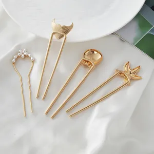 Gold marine series U-shaped hair fork set, featuring pearl flower and shell designs for elegant updos.