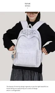 Casual embroidered letter backpack for women, stylish large capacity school bag for daily travel.