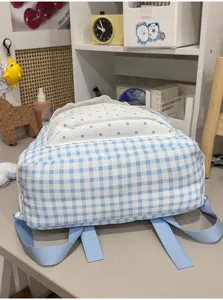 Koreaanse zoete blauw-witte ruitjesrugzak met stippenzak en schattige kanten afwerking voor.