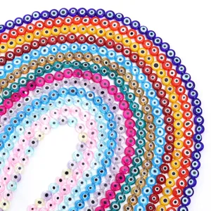 Colorful translucent glass evil eye flat round spacer beads detail shot for DIY bracelet design.