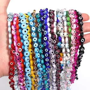 Colorful glass evil eye flat round beads for DIY bracelet making and jewelry crafting wholesale.