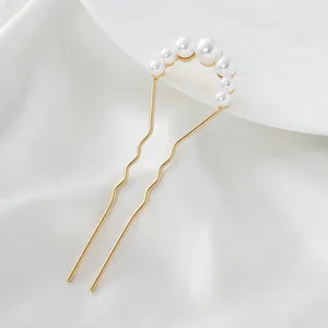 Gold U-shaped pearl hair fork detail, elegant hair pin accessory for daily styling.