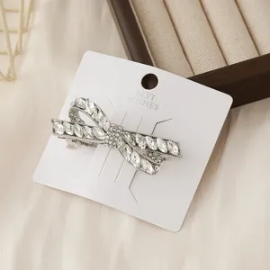 Exquisite crystal rhinestone bow hair clip, silver alloy fashion hair accessory for daily wear.