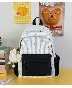 Wit zwart gestreepte sterren rugzak stijlvolle schooltas met voorzak en schattige pluche