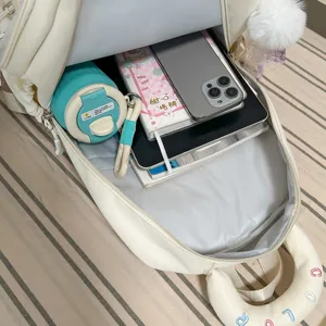 Leuke witte studentenrugzak grote capaciteit casual schooltas met pluche pomponhanger