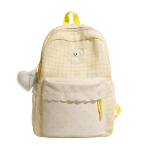 Schattige gele ruitjes rugzak met puppy borduurwerk en kanten rand voor dagelijks schoolgebruik.