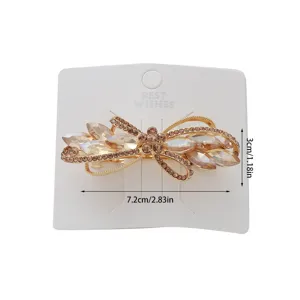 Gold rhinestone bow hair clip with measurement details, perfect for daily commuting and cute style.