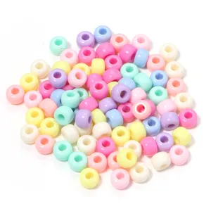 Perles tonneau en acrylique colorees macaron grand trou pour chaines de telephone et colliers DIY.