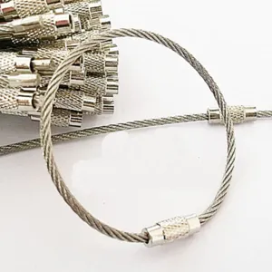 Stainless steel wire cable keychain ring detail showing the durable loop and threaded screw lock.