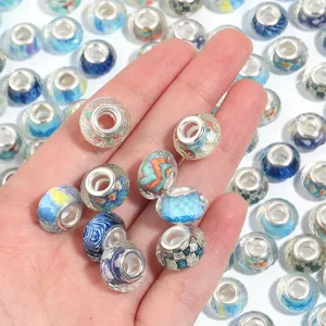 Detailed close-up of colorful resin large-hole charm beads with silver cores for DIY bracelets.