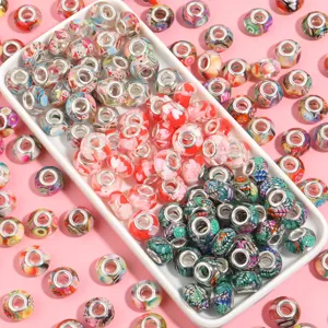 Colorful resin large hole charm beads with diverse cute patterns for DIY bracelet jewelry making.