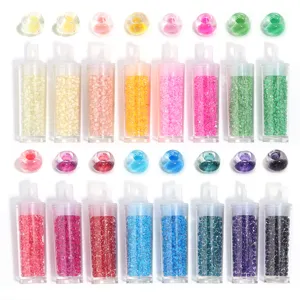 Colorful 3mm transparent core dyed glass seed beads in clear tubes, ideal for DIY jewelry making.