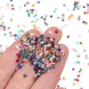 Wholesale 2mm colorful tubular glass seed beads for DIY handmade jewelry crafting.