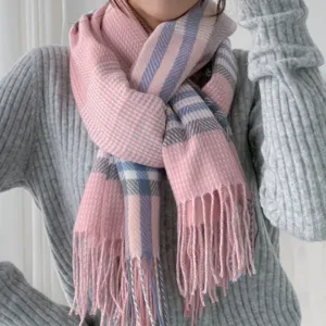 Cozy pink plaid winter scarf with fringe, soft cashmere-feel fabric, stylish cold weather accessory.