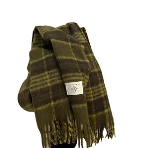 Cozy mohair blend plaid scarf in olive green and brown, stylish winter tassel wrap accessory.