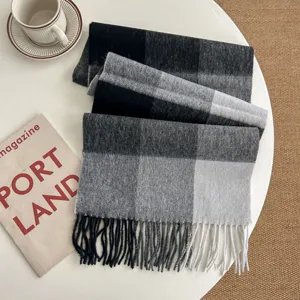 Classic black and grey plaid wool winter scarf with fringe detail, cozy and warm for couples.