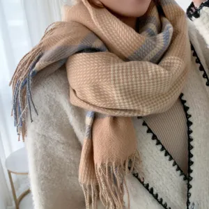 Cozy winter cashmere-feel plaid scarf for women with elegant tassels and warm camel design.