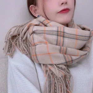 Cozy winter plaid scarf in classic beige with orange and grey stripes, soft fringed edges.