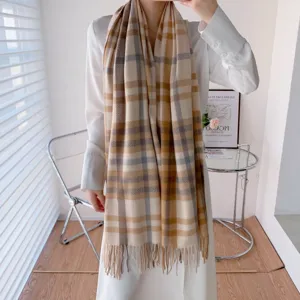 Classic plaid winter scarf for women, soft imitation cashmere long shawl with fringe details.