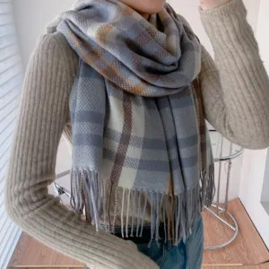 Detailed view of women long plaid tassel scarf, cozy cashmere feel winter neck warmer.