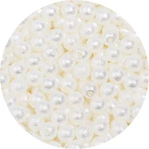 White matte ABS pearl beads with holes, perfect for DIY jewelry and wedding crafts.