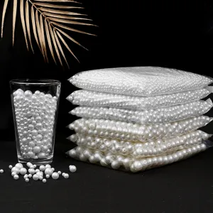 Detailed view of frosted white drilled ABS faux pearl beads, perfect for DIY wedding jewelry.