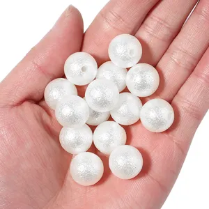 White frosted imitation pearl beads with holes, perfect for DIY jewelry and wedding decor.