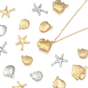 Stainless steel marine charms close-up showing gold silver starfish and seashell for DIY jewelry.
