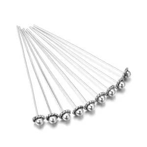 Detail view of metal head ball pins, DIY handmade jewelry making accessories and findings.