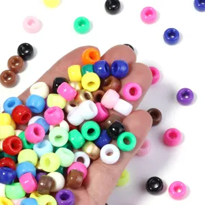 Perles de tonneau en acrylique colorees pour bracelets DIY et accessoires de bijoux.