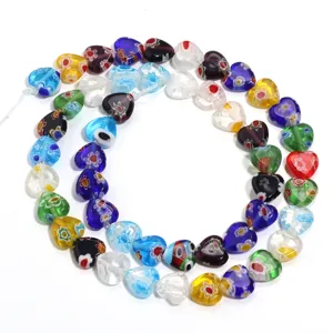 Colorful millefiori glass heart beads, vibrant DIY jewelry accessories strand.
