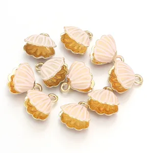 Pendentifs coquillage émaillés plaqués or pour fabrication de bijoux DIY rose.