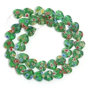 Green heart millefiori glass beads for DIY handmade bracelets, colorful floral charm jewelry.